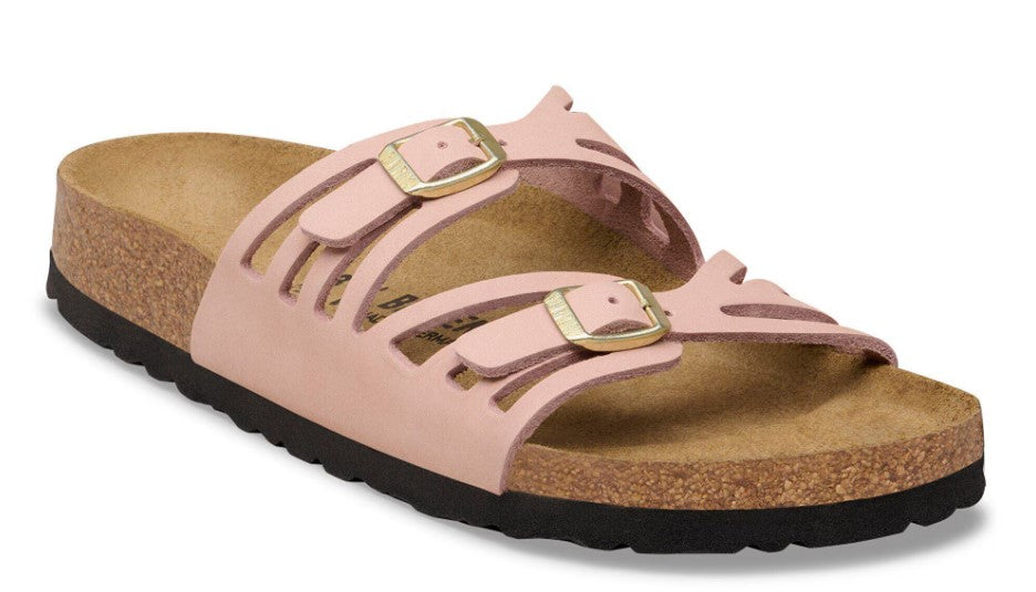 Pink slide sandal with adjustable straps and gold buckles.