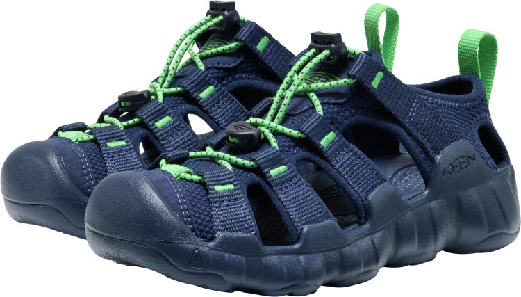 A pair of navy blue sandals with bright green bungee laces and heel straps.