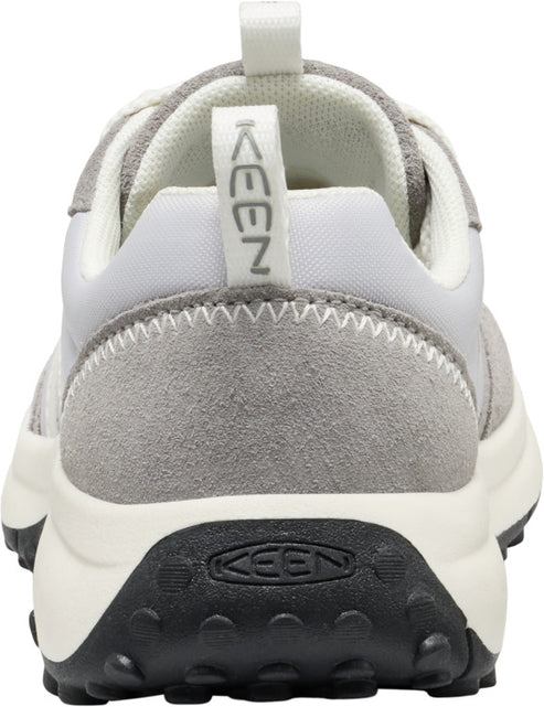 Back view of a KEEN sneaker, grey suede and white textile upper, white midsole and black lug outsole.