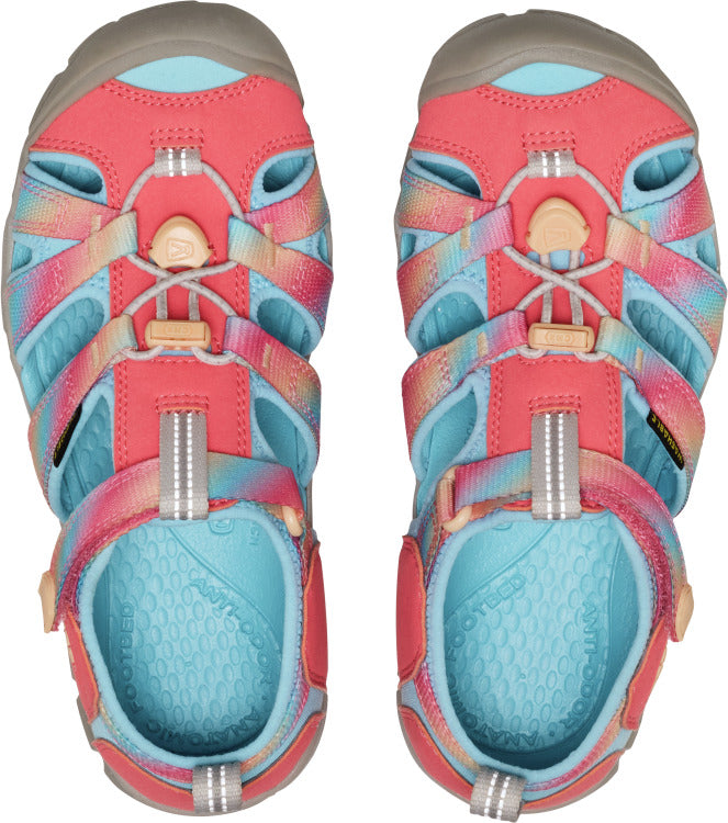 Two shoes, seen from above, with coral trim, turquoise insole, colorful straps, and bungee laces.