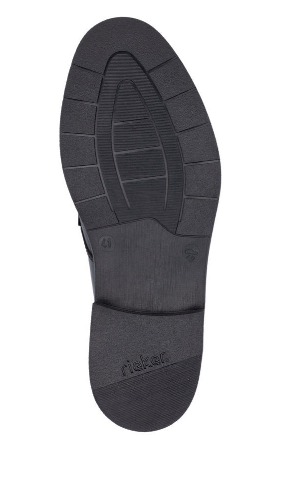 Black shoe outsole with visible size marking and 'rieker' text.