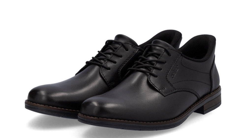 Pair of black leather lace-up dress shoes