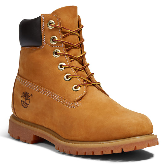Tan leather work boot with brown collar, gold eyelets, and lug sole.