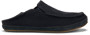 Black slip-on shoe with a brown sole.