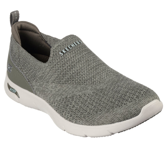 Slip-on gray knitted shoe with white sole and the text "SKECHERS" on the side.