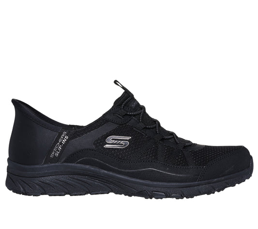 Black slip-on athletic shoe with knit upper and elastic laces, "SLIP-INS" text on side.