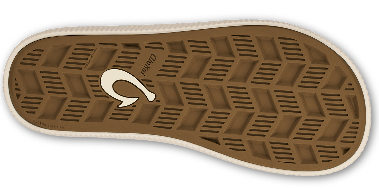 Bottom view of brown sole with tread.