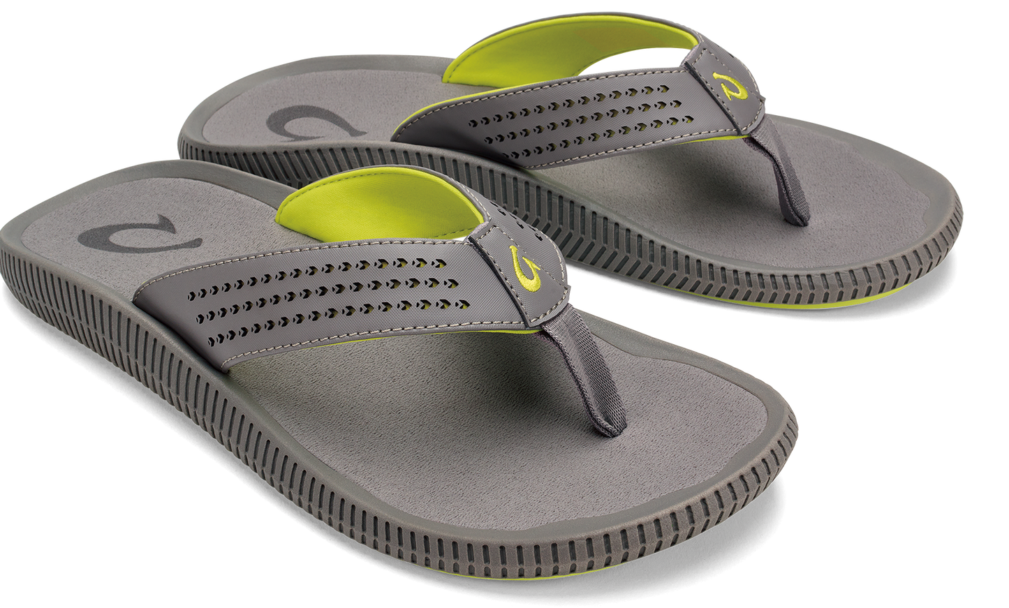 A pair of gray flip-flops with lime-green linings.
