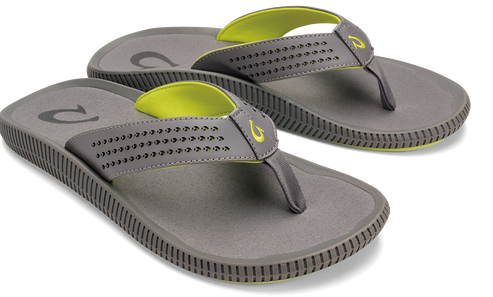 A pair of gray flip-flops with lime-green linings.