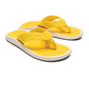 Yellow flip-flops with white soles.