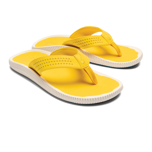 Yellow flip-flops with white soles.