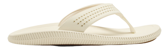 Off-white sandal with a thong style and decorated upper strap.