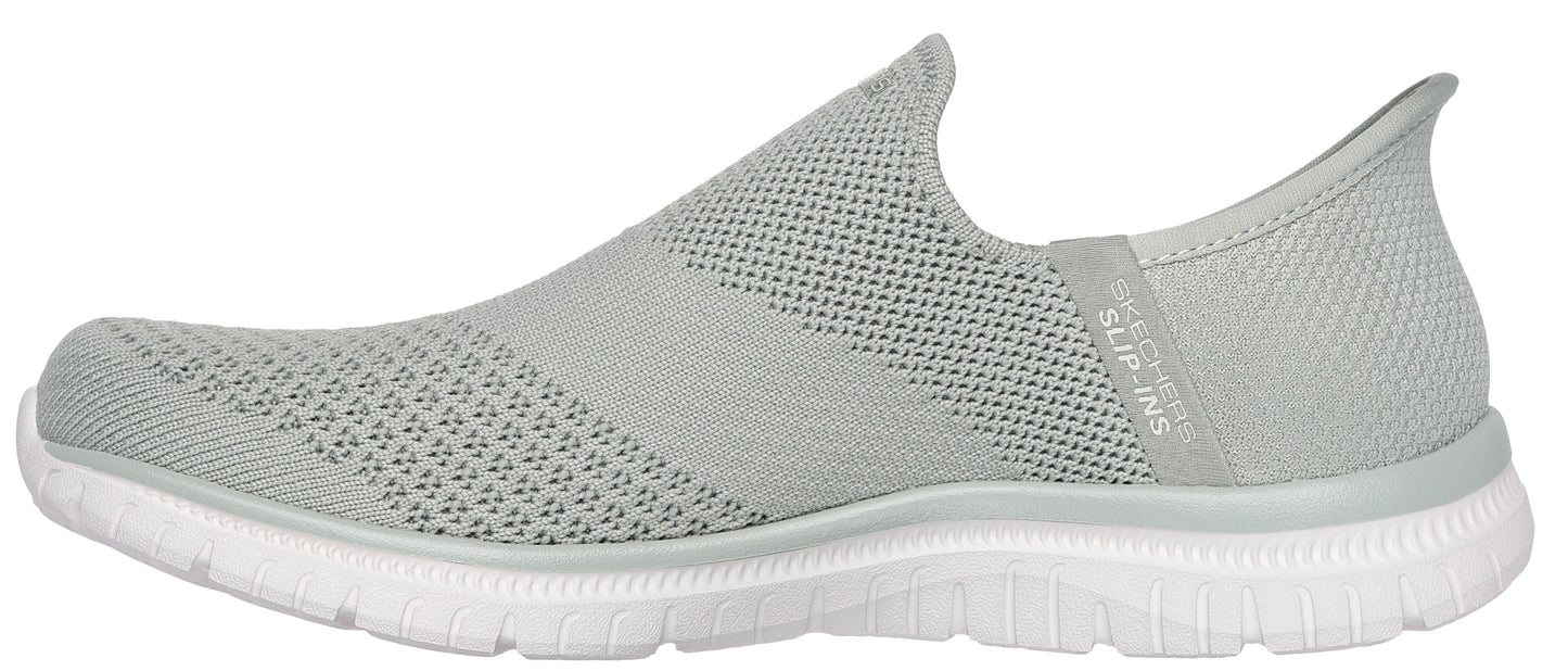 A gray slip-on shoe with a knit upper and a white sole.