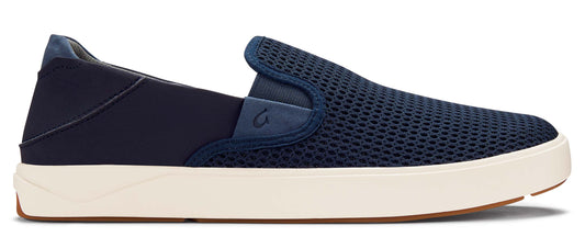 A slip-on shoe in navy, featuring a mesh upper and a contrasting white sole.