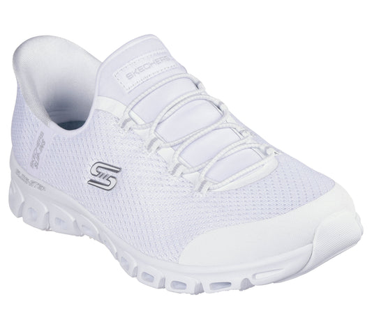 White low-top shoe with a mesh upper, white laces, and a thick, textured sole.