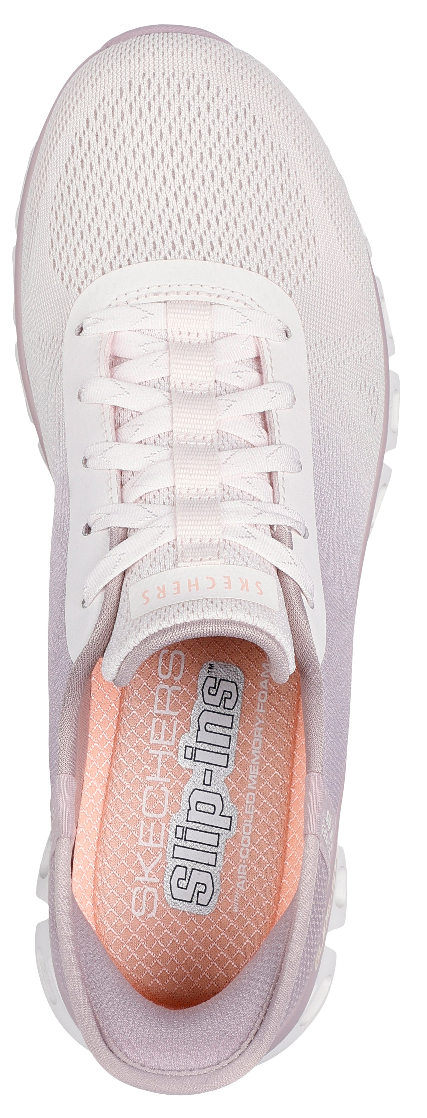 Top view of a light purple sneaker with laces and light orange inner sole, showing the text 'SKECHERS Slip-ins'.