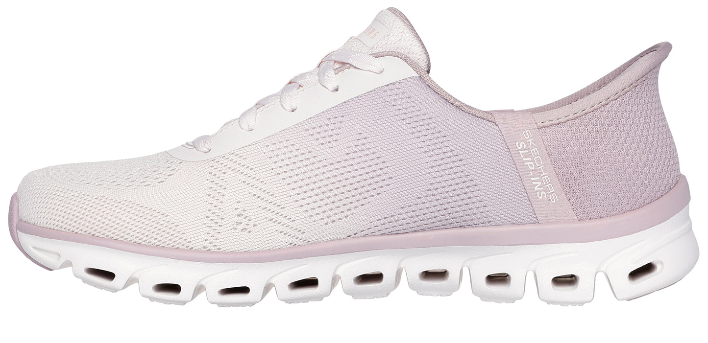 A side view of a white sneaker with a lavender mesh heel and white sole with horizontal cutouts.