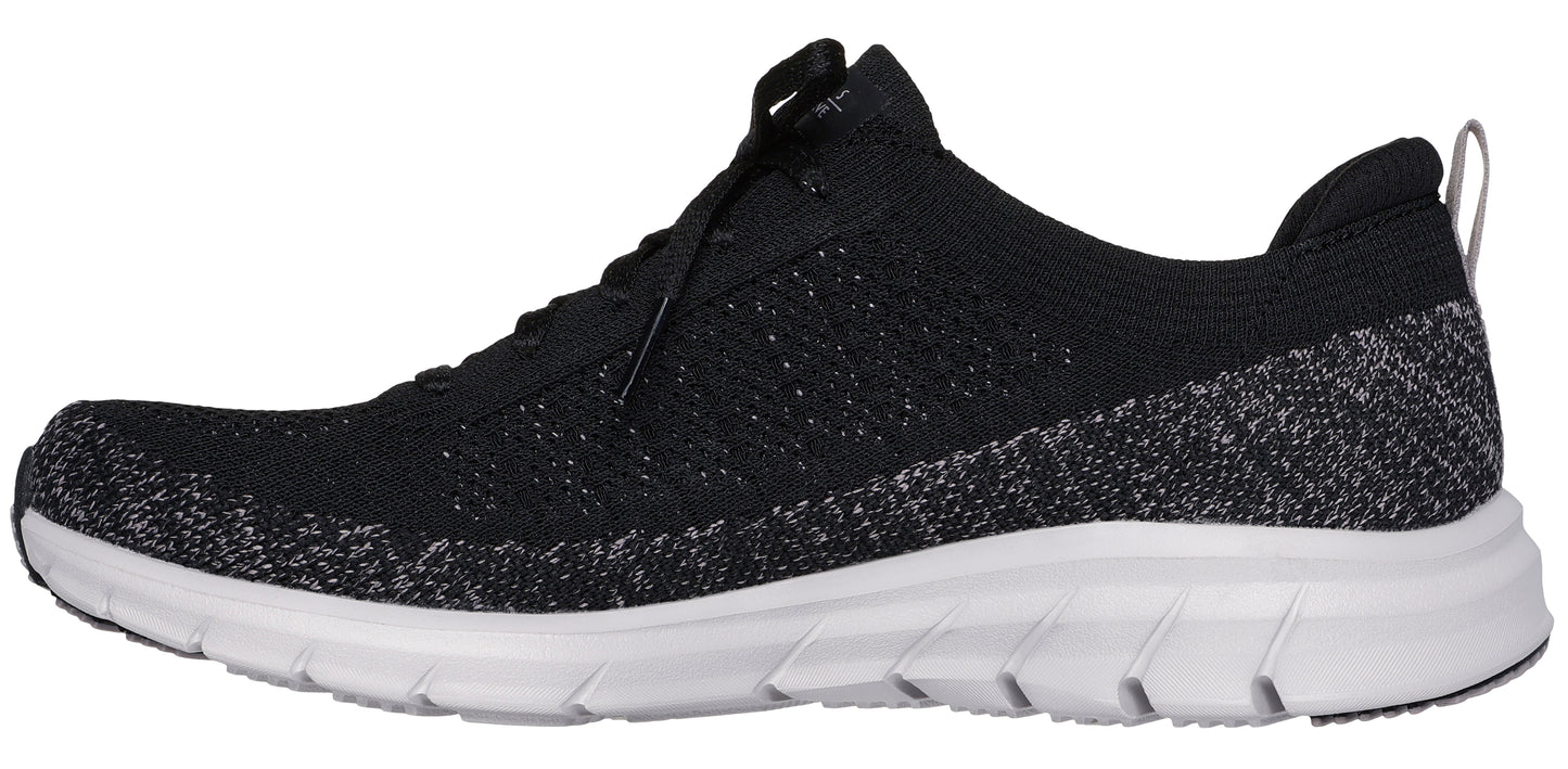 Black knit-like running shoe with white sole.
