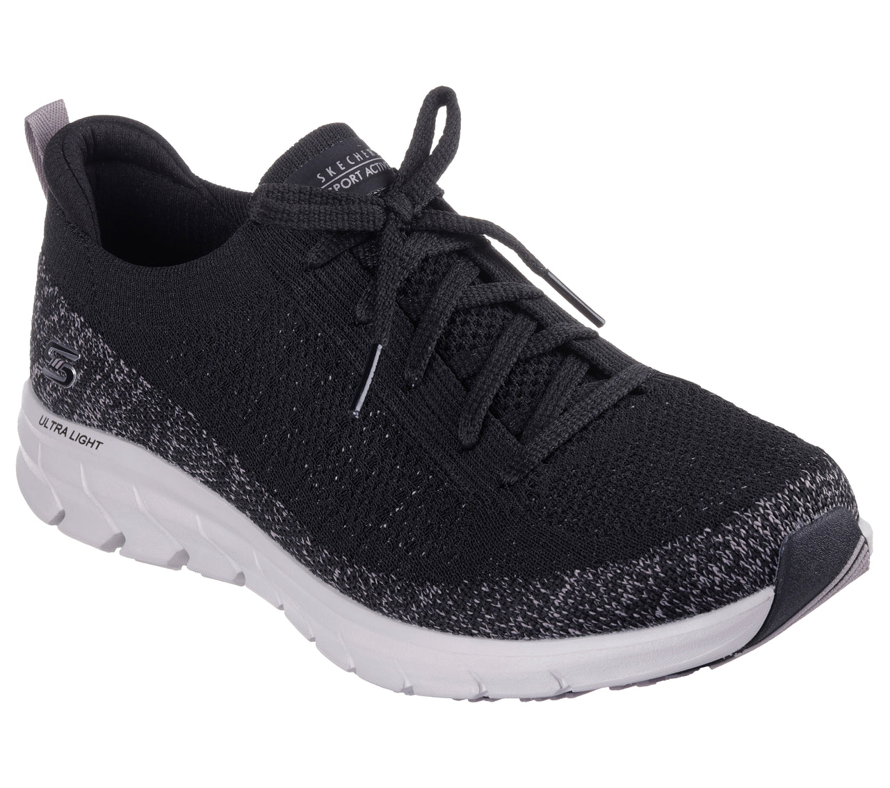 Black knit sneaker with speckled heel and white sole