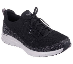 Black knit sneaker with speckled heel and white sole