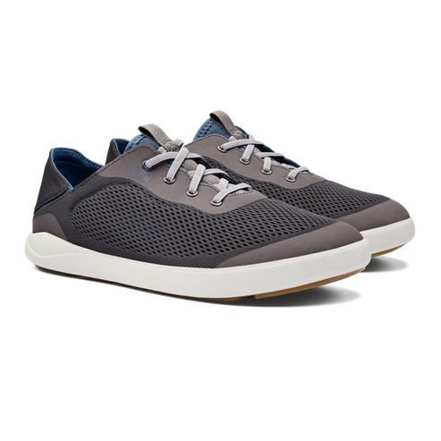 A pair of gray and white casual shoes with gray laces.