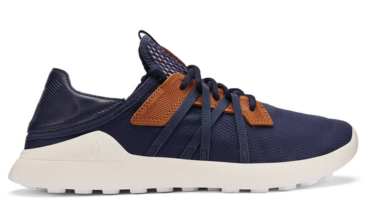 A navy blue athletic shoe with brown accents and white sole.