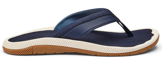 A navy-blue flip-flop with a brown sole.