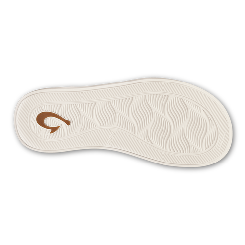 An off-white footwear sole featuring a light brown hook logo near the heel and a textured wave pattern across the surface.