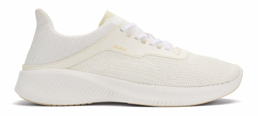 A women's off-white athletic shoe with matching sole and laces.