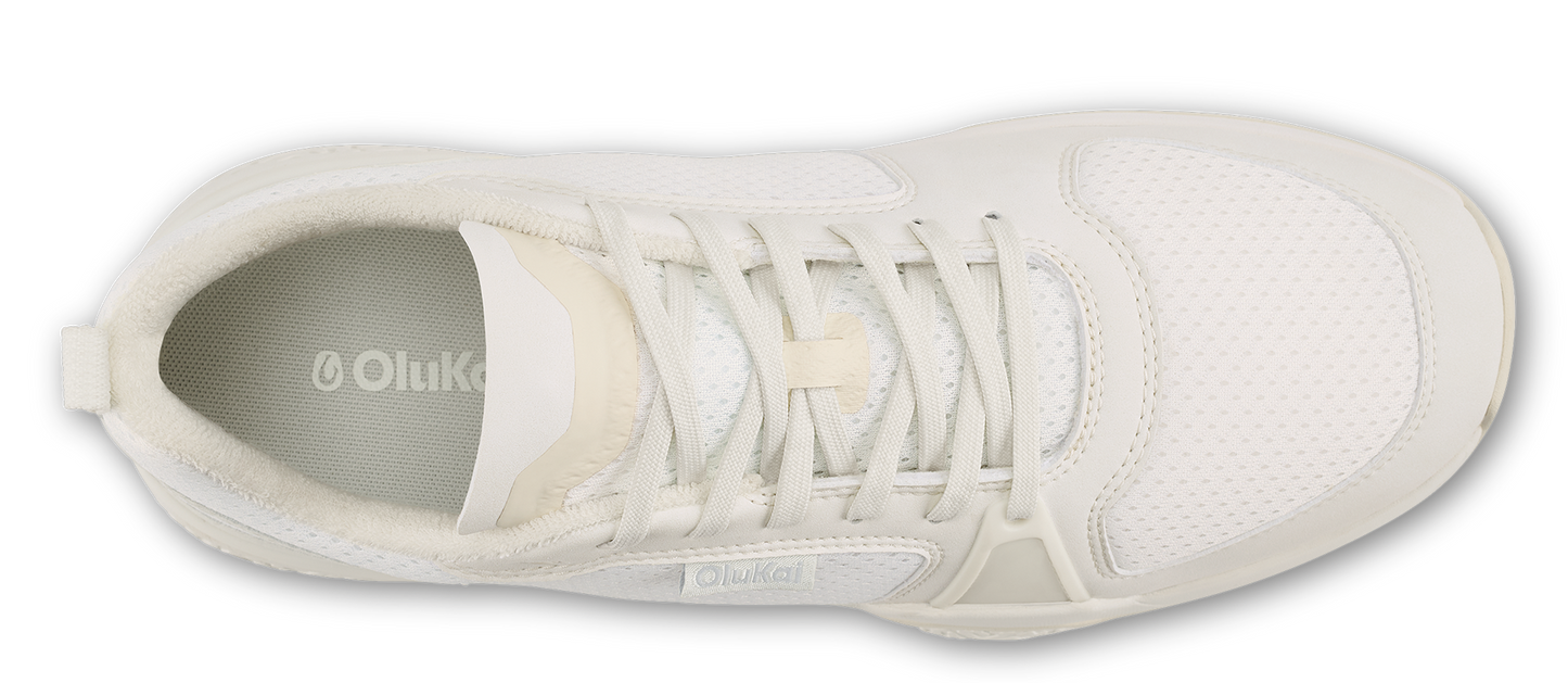 a white sneaker with white laces and a padded interior