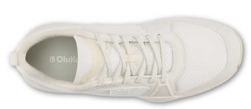 a white sneaker with white laces and a padded interior
