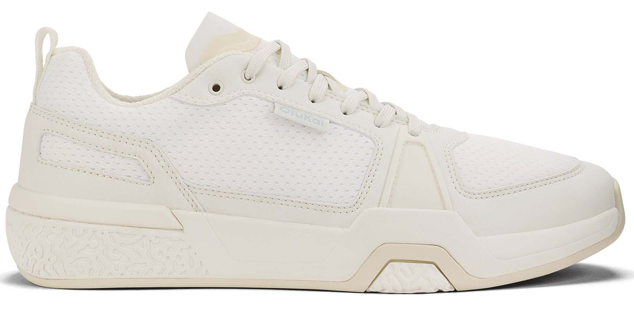 A white athletic sneaker with white laces and a thick white sole.