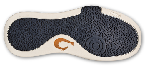 A shoe sole with a textured blue pattern and a golden logo.