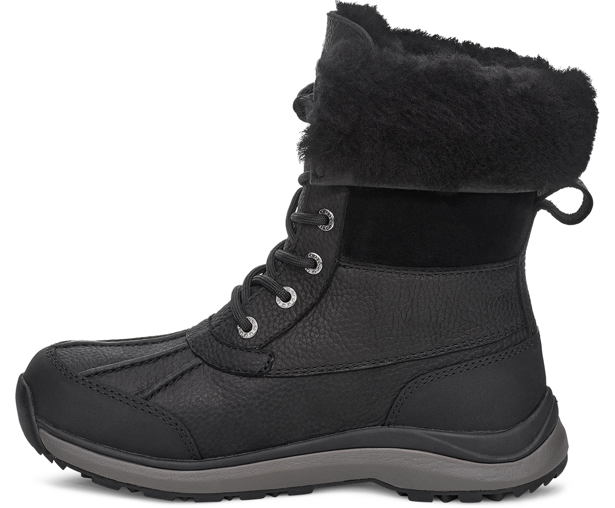 Black leather lace-up boot with fur trim.