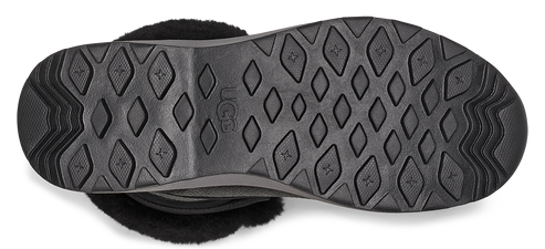 The outsole is black, with diamond shapes and stars inside the diamonds.