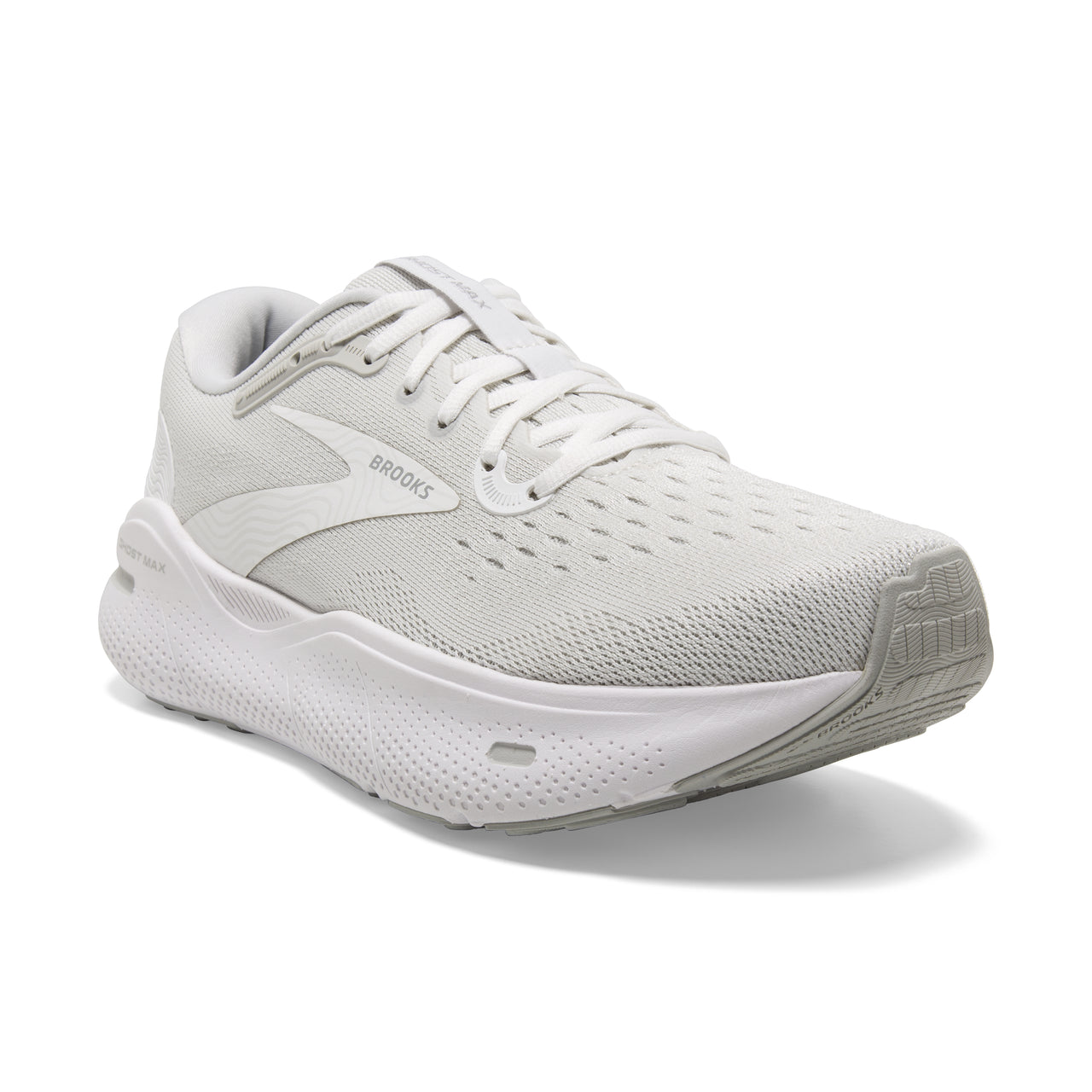 A white running shoe with laces and the word "BROOKS" in grey near the heel.