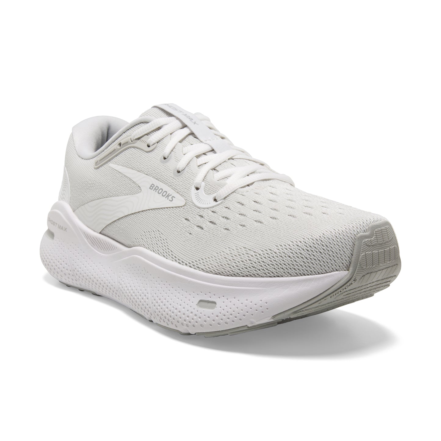 A white running shoe with laces and the word "BROOKS" in grey near the heel.