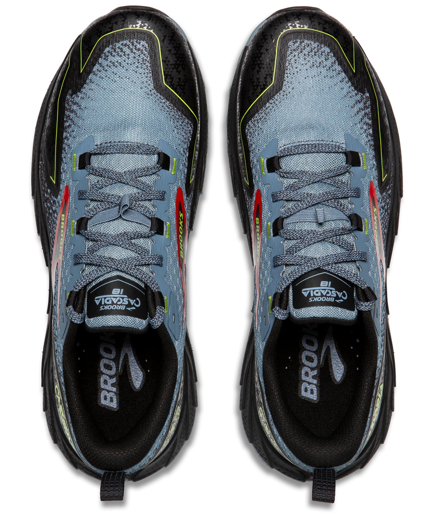 Top-down view of two trail running shoes. The shoes are blue, gray, black, red and neon green, with dark gray laces.  'Brooks Cascadia 16' is printed on the tongue of each shoe.