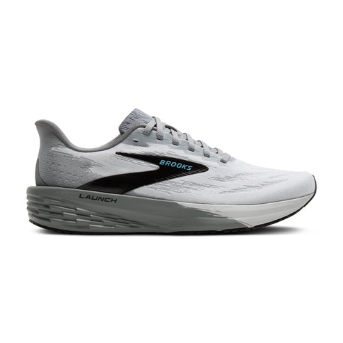 A running shoe that is white with gray soles and a black swoosh that has the word "BROOKS" in blue.