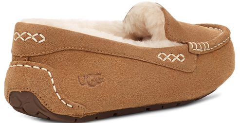 Tan suede slipper with white stitching detail and fur lining
