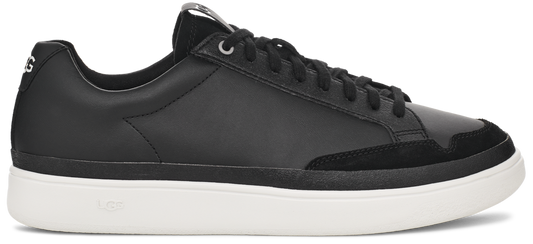 A black leather sneaker with black laces and a white sole.