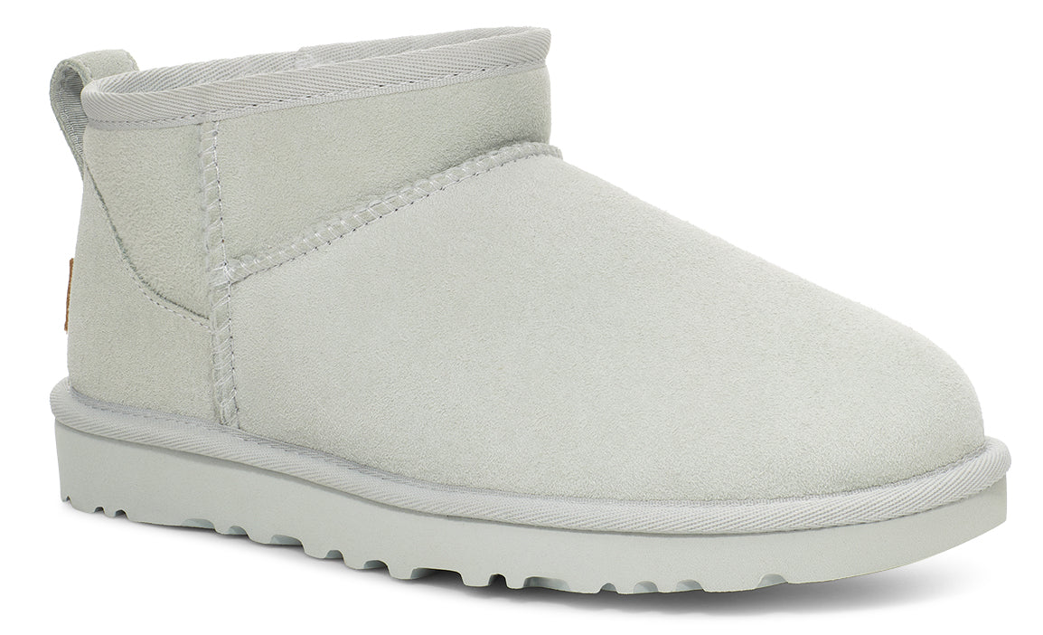 Short, light gray boot with a flat sole.