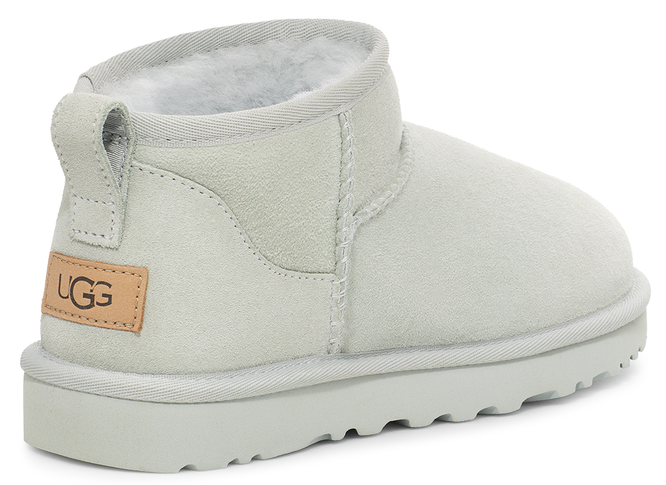 Light gray ankle boot with a visible UGG tag.