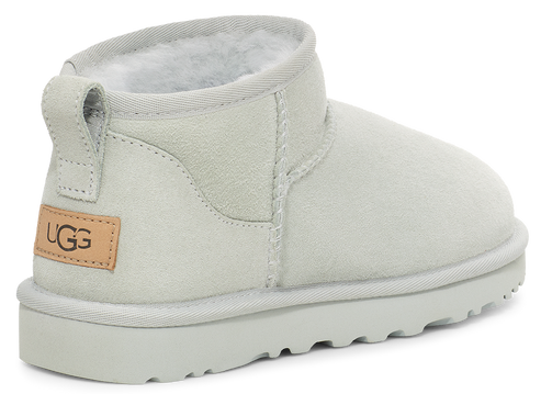 Light gray ankle boot with a visible UGG tag.