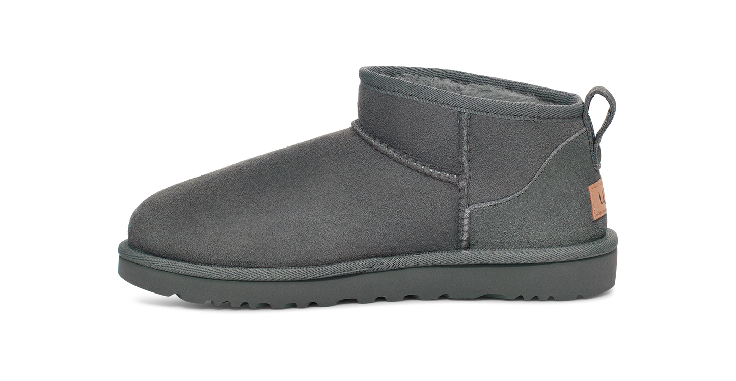 Gray UGG mini boot, side view.