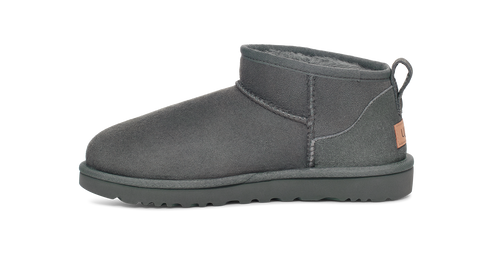 Gray UGG mini boot, side view.