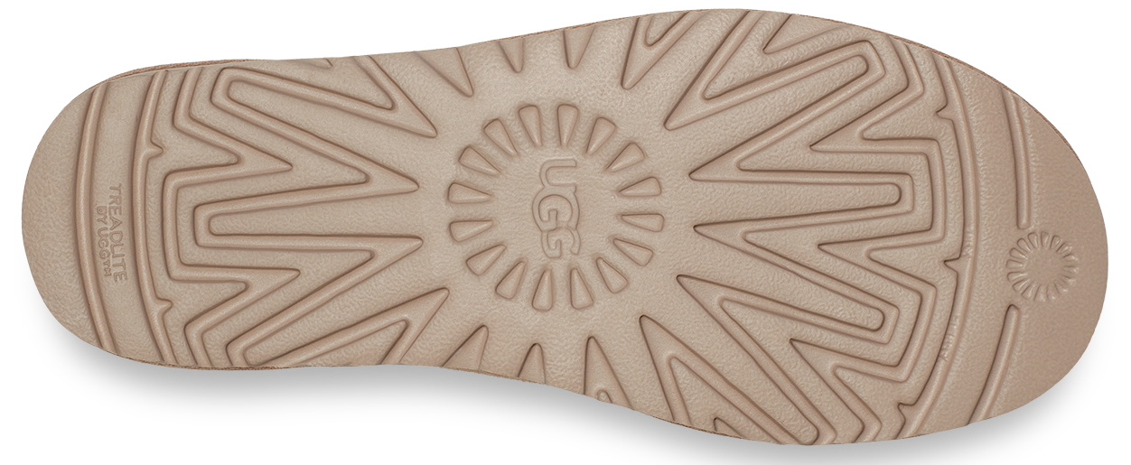 UGG sole with the brand name in a circular pattern, and zigzag treads.