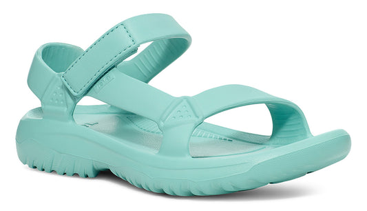 Mint green sandal with adjustable velcro straps.