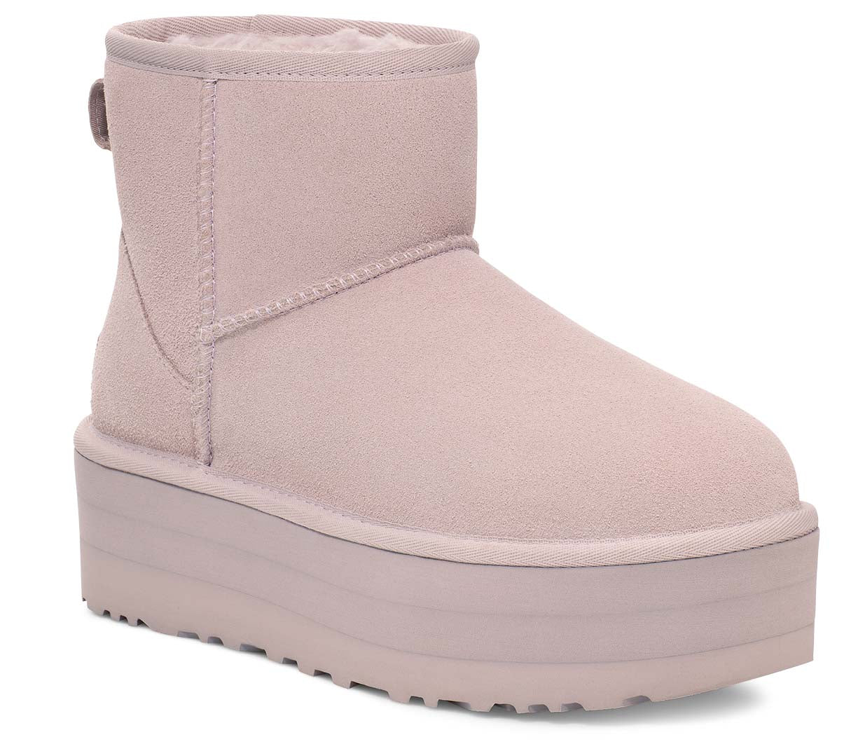 Platform pink suede ankle boot.