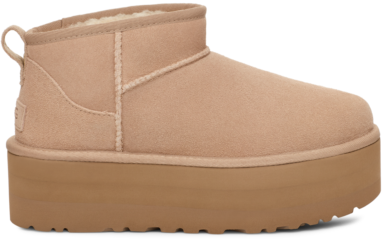 Tan suede platform boot with a pull tab.